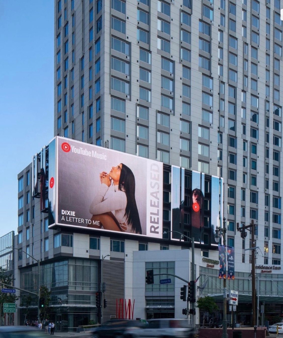 Dixie D’Amelio’s A Letter To Me on a YouTube Music billboard in Los Angeles